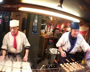 Evening Street Food Hopping Tour in Downtown Osaka